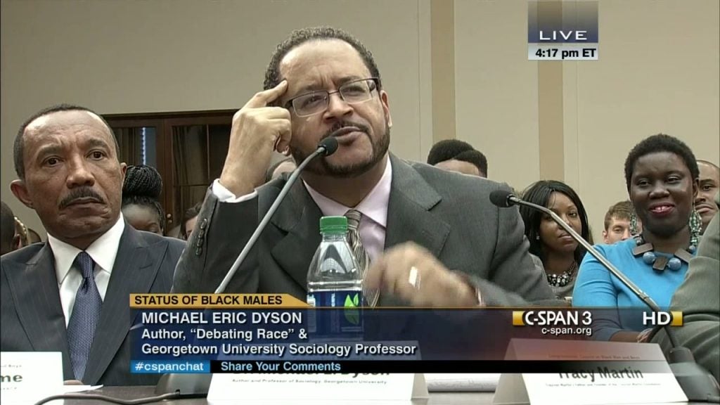 C-Span coverage of a man in a suit speaking into a microphone with the caption 