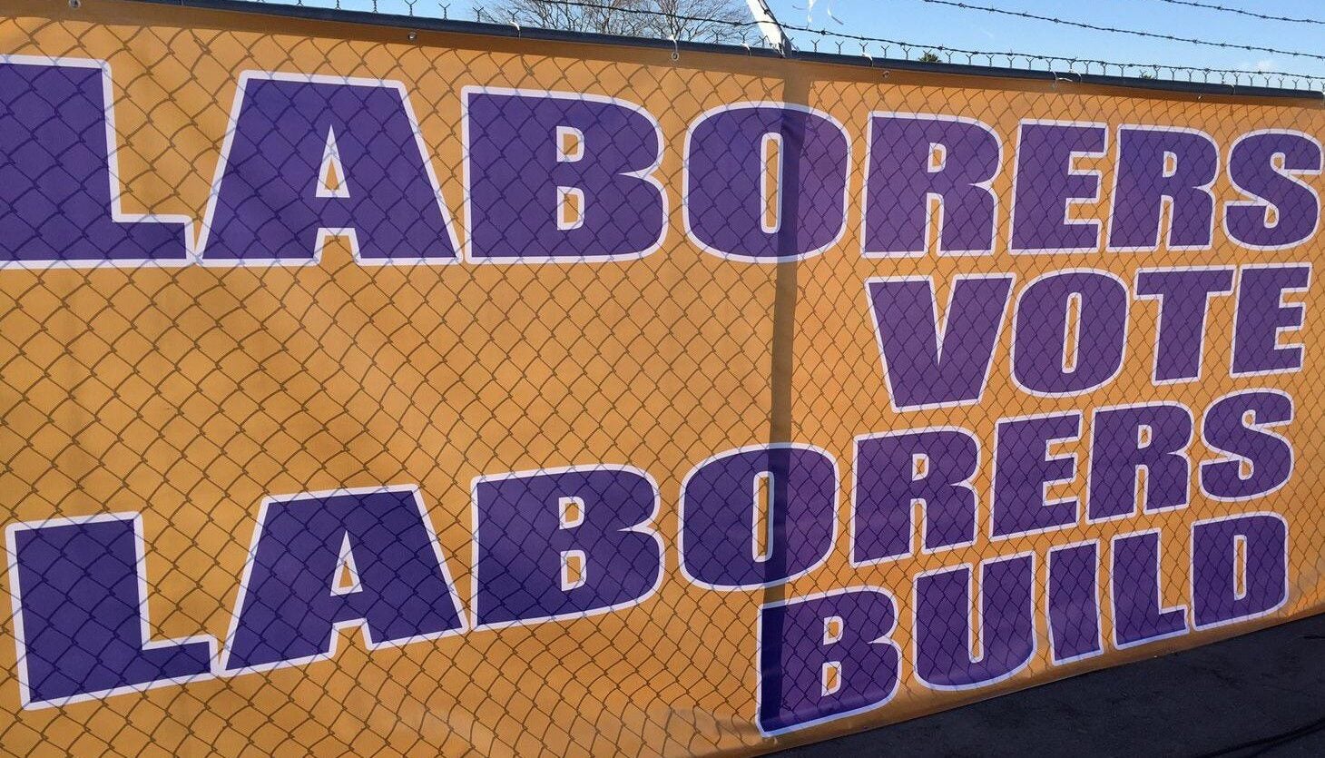 Sign that reads "Laborers Vote Laborers Build."