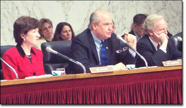 Three senators sitting in front of microphones at a hearing